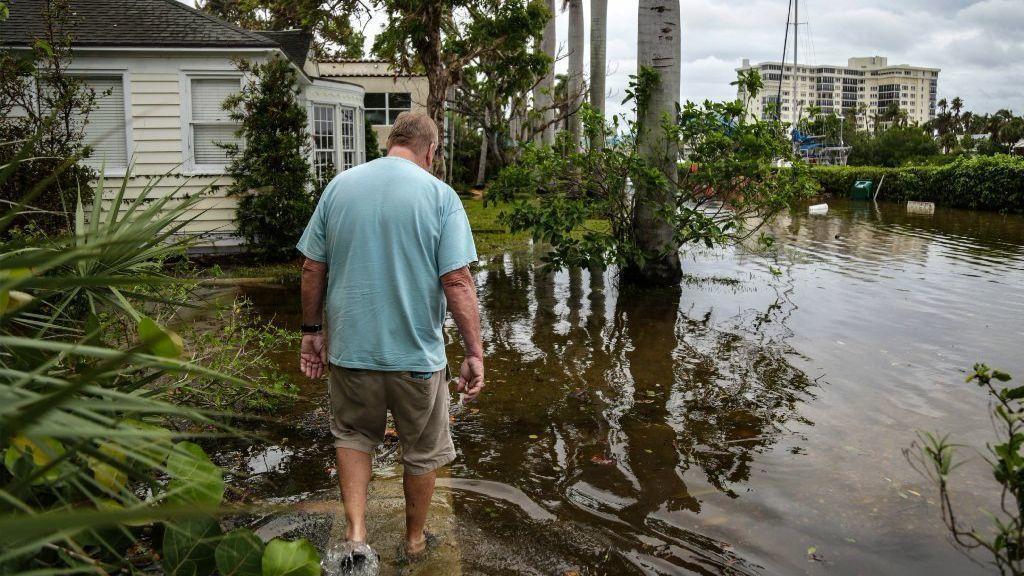 Warming ocean water contributes to sea level rise and can strengthen hurricanes. Hurricane Irma's storm surge last year was the latest to flood Jacksonville, Florida. Credit: Sean Rayford/Getty Images